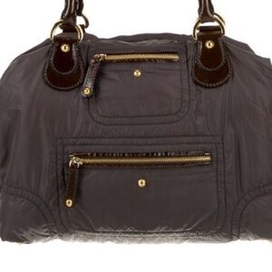 Tod’s nylon women’s black shoulder/handbag with gold hardware